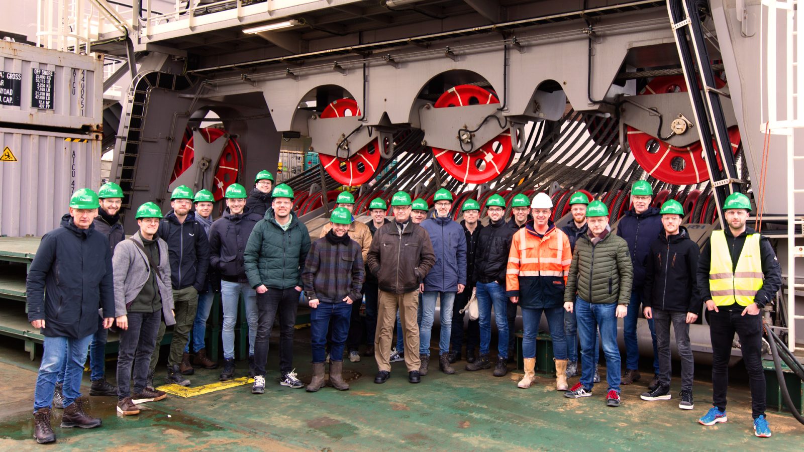 The proud engineering team of MechDes Engineering during a site visit to the Allseas Pioneering Spirit. You can see them standing in front of the JLS (Jacked Lift System) Beam Rest and the DHS (Derrick Hoist System) Sheave Skids.